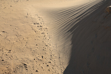 Texture of sand and earth, sand dunes and mountains