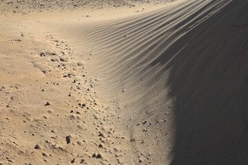 Texture of sand and earth, sand dunes and mountains