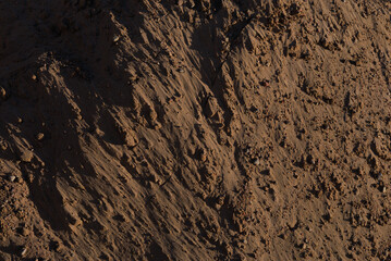 Texture of sand and earth, sand dunes and mountains