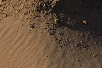 Texture of sand and earth, sand dunes and mountains