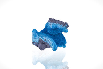 Blue Shattuckite. Specimen from Mesopotamia Farm 504, Namibia. photography isolated on white blackground. macro detail background. close-up mineral crystal unpolished semi-precious gemstone.