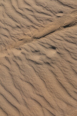 Texture of sand and earth, sand dunes and mountains