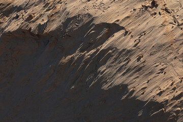 Texture of sand and earth, sand dunes and mountains