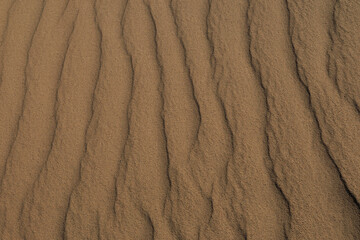 Texture of sand and earth, sand dunes and mountains