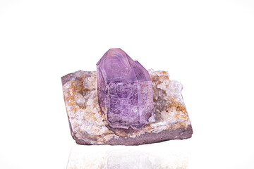 Amethyst crystal. Specimen from Erongo, Namibia. photography isolated on white blackground. macro detail background. close-up mineral crystal unpolished semi-precious gemstone.