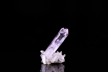 Amethyst crystal. Specimen from Erongo, Namibia. photography isolated on black background. macro detail close-up mineral crystal unpolished semi-precious gemstone.
