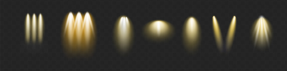 Vector spotlight. Yellow color light effect. Glowing isolated golden sparkling light effect. Spark spotlight special effect design. Ray vector element.