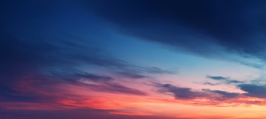 Naklejka premium Vibrant Sunset Sky with Pink and Orange Clouds