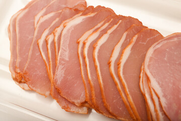 Ham cut into thin slices.