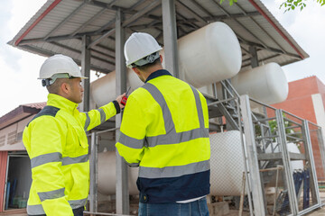 Engineers and supervisor work place to keep liquid helium,preventive maintenance schedule checking,Thailand people,Consult technical problems