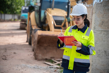 Civil Engineers, Managers, and Site Supervisors Collaborating on a Construction Site to Ensure...