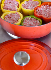 stuffed parika with raw minced meat in a pan before cooking

