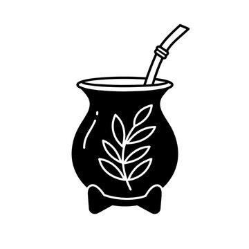 Traditional yerba mate gourd with bombilla straw. Argentinian Independence Day celebration includes this iconic beverage.  Yerba mate is a symbol of Argentine culture and national identity.