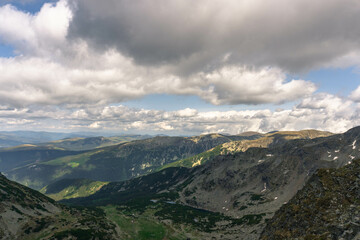 Naklejka premium mountain landscape with clouds carpathians with lakes down