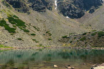mountain landscape with lake and mountains crystal clear water