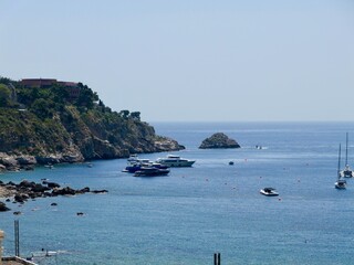 View of the Ionian Sea coast at Taormina town, Sicily, Mediterranean Sea coast. Italy