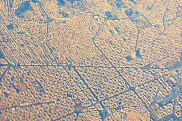 Aerial view of Barcelona, showcasing distinctive grid-like urban layout with numerous intersecting...
