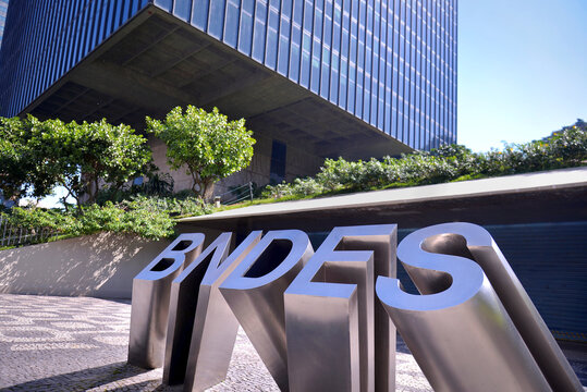 BNDES facade in Rio de Janeiro. BNDES logo in front of the building. In portuguese: Banco Nacional de Desenvolvimento Econ&ocirc;mico e Social.  Rio de Janeiro, Brazil: 03.29.2025