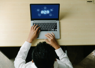 Business person navigates B2B landscape, harness technology to enhance business-to-business...