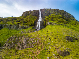Aerial drone view of a waterfall Bjarnarfoss in Snaefellsnes Peninsula.