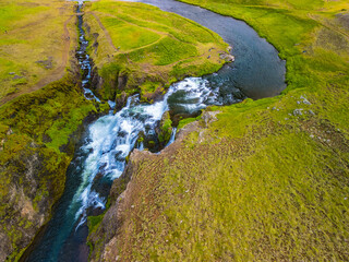 Aerial drone view of Fosslaug waterfall, Iceland