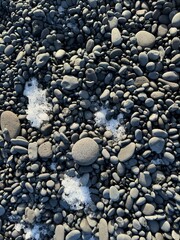 black stones on the beach