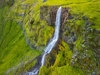 Aerial drone view of a waterfall Bjarnarfoss in Snaefellsnes Peninsula.