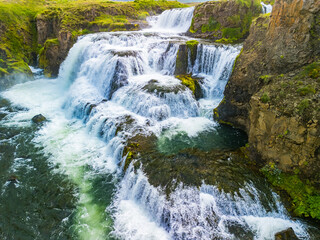 Obraz premium Aerial drone view of Fosslaug waterfall, Iceland