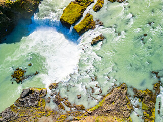 Godafoss waterfall with colorful sunset sky in summer at Iceland