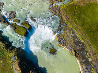 Godafoss waterfall with colorful sunset sky in summer at Iceland