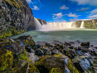 Godafoss waterfall with colorful sunset sky in summer at Iceland