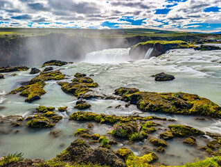 Godafoss waterfall with colorful sunset sky in summer at Iceland