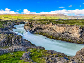 Godafoss waterfall with colorful sunset sky in summer at Iceland