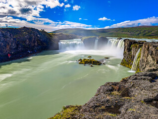 Godafoss waterfall with colorful sunset sky in summer at Iceland