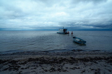 boats in sea, beach, cloudy sky