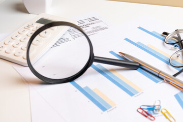 Data Analysis and Financial Report with Charts, Magnifier, Pen, and Calculator – Strategic...