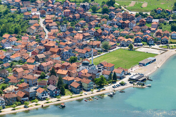 The cozy town of Divic on the bank of the Drina River, surrounded by the Balkan Mountains. Bosnia and Herzegovina