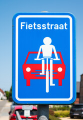 Traffic sign of a Fietsstraat, with priority for bikes over the car in Keerbergen, Flemish Brabant,...