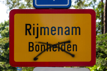 Red orange road sign of Rijmenam, Bonheiden, Flemish Brabant, Belgium