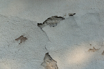 Texture of old grey plaster, wall