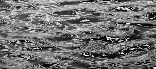 Water surface with reflections of light