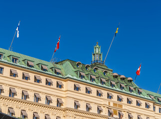 Obraz premium Detail of Hôtel rooftop in Stockholm with Nordic flags