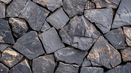 Fototapeta premium Flagstone texture blue gray stone pavers mosaic arrangement top down perspective weathered natural surfaces color variations shadows between joints
