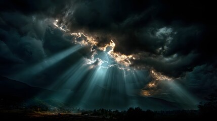 Dramatic Sunbeams Breaking Through Dark Storm Clouds Over Mountain Landscape perfect for environmental campaigns, cinematic backdrops, nature documentaries, spiritual themes weather-related content