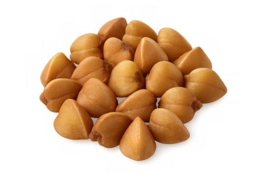 Roasted buckwheat groats creating heap on clean transparent surface, representing nutritious whole grain ingredient