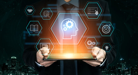 Head with gear and icons representing learning, digital training, and development process, showing...