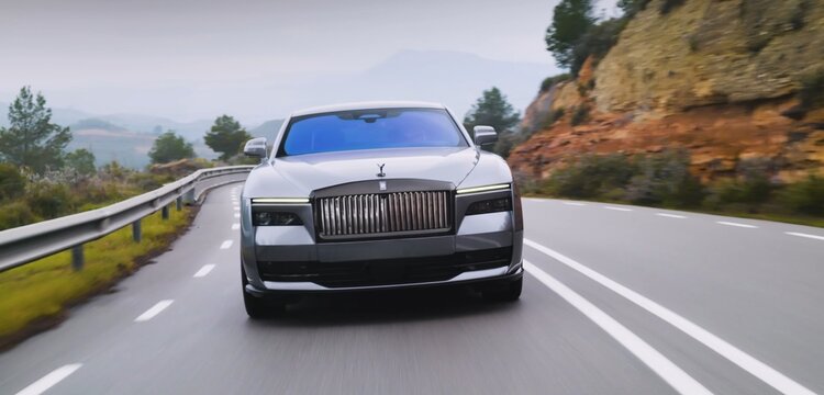 Rolls Royce, expensive car, luxury limousine. car driving on a highway