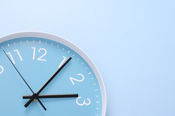 Close-up of a wall clock. The concept of time and work time is valuable for life, Alarm clock...