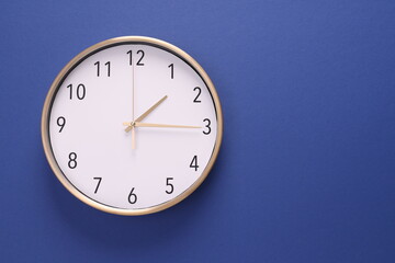 Close-up of a wall clock. The concept of time and work time is valuable for life, Alarm clock...