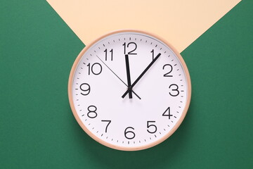 Close-up of a wall clock. The concept of time and work time is valuable for life, Alarm clock...